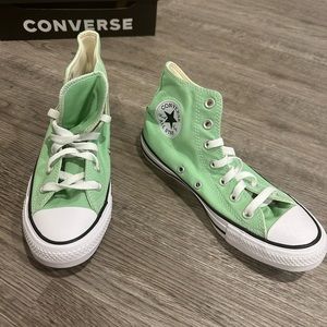 New converse shoes. 7.5 women, 5.5 men. Never worn, light green, high top.